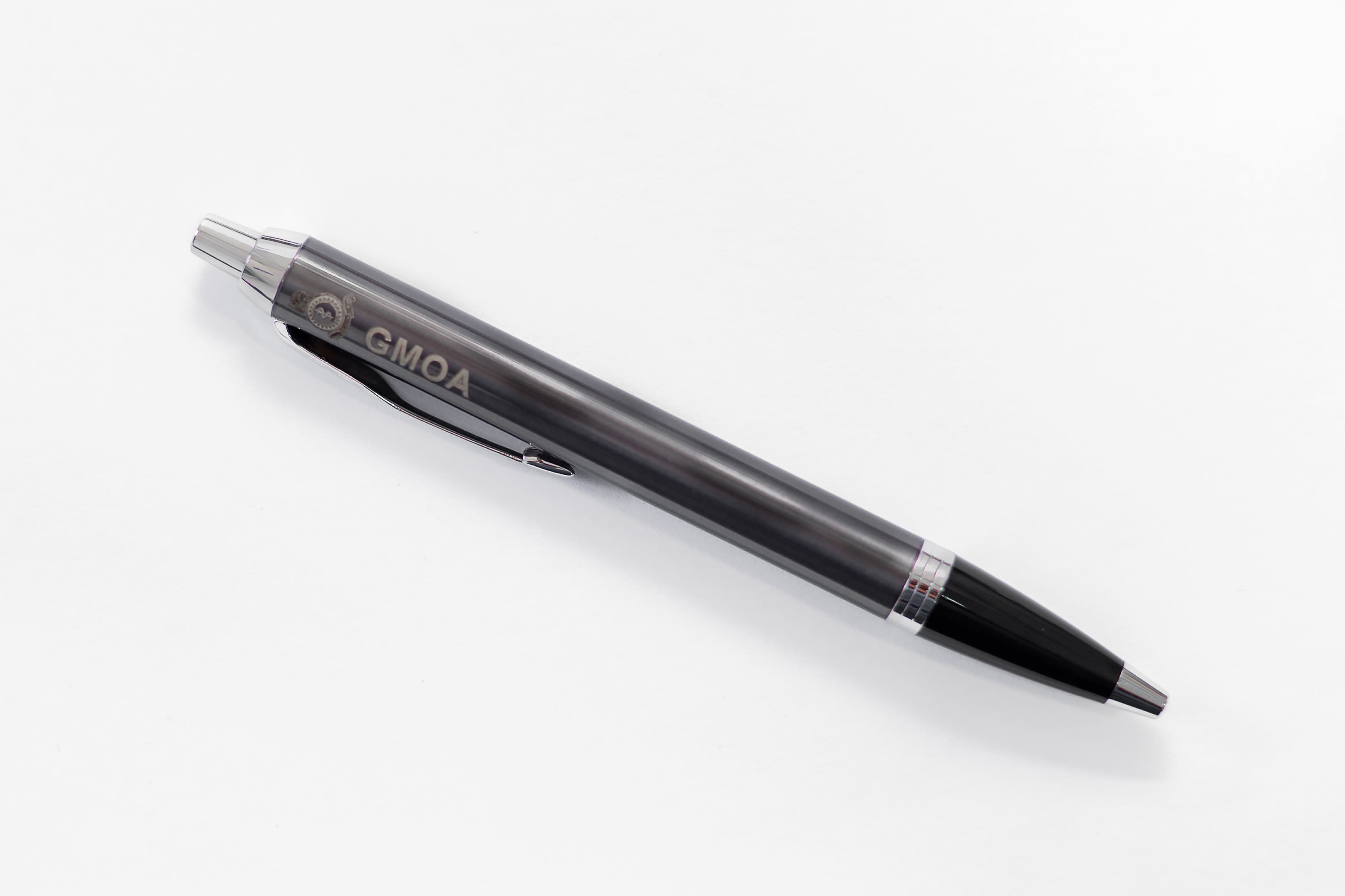 Engraved pen sample — GMOA