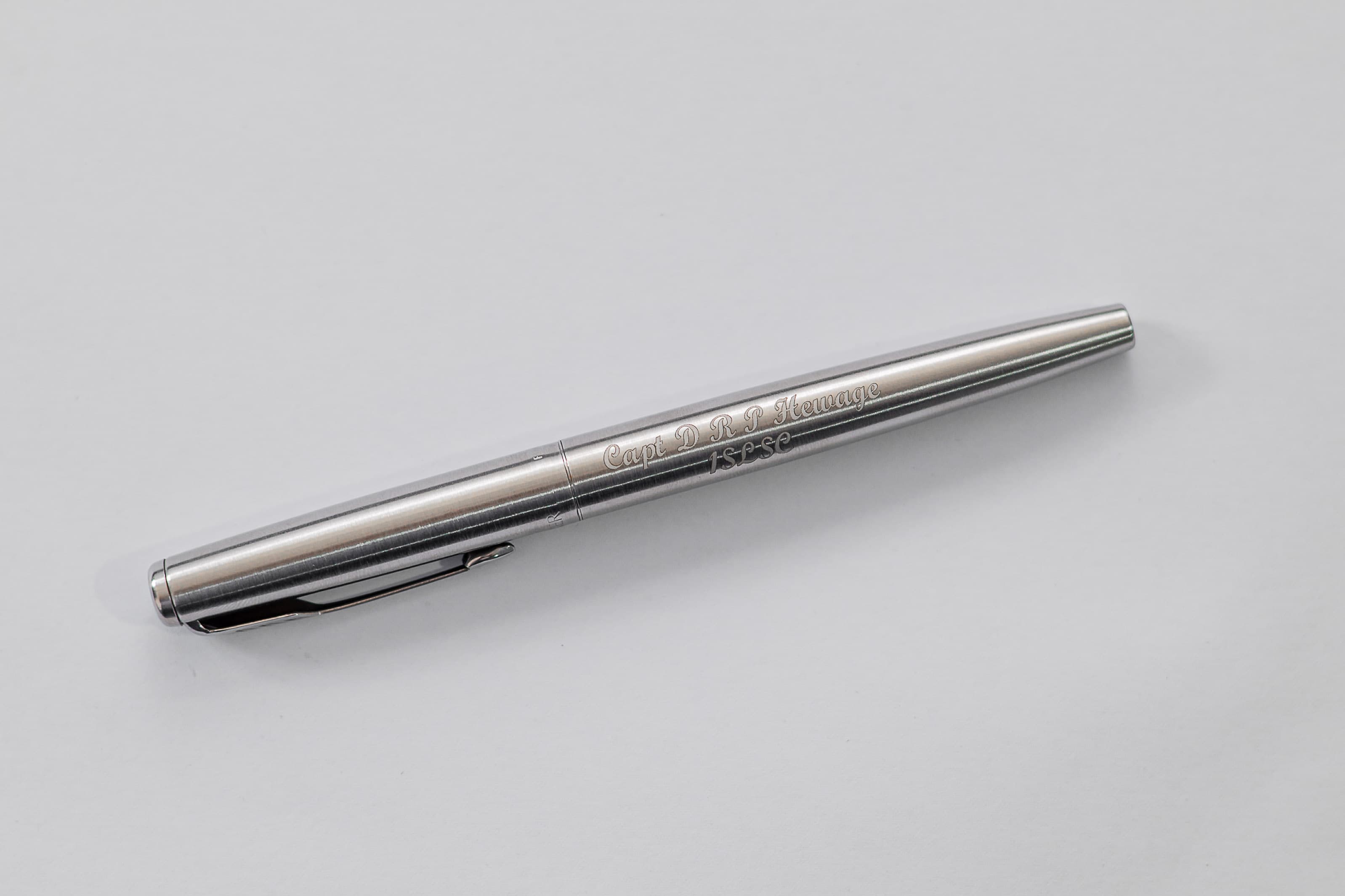 Engraved pen sample — Capt D R P Hewage