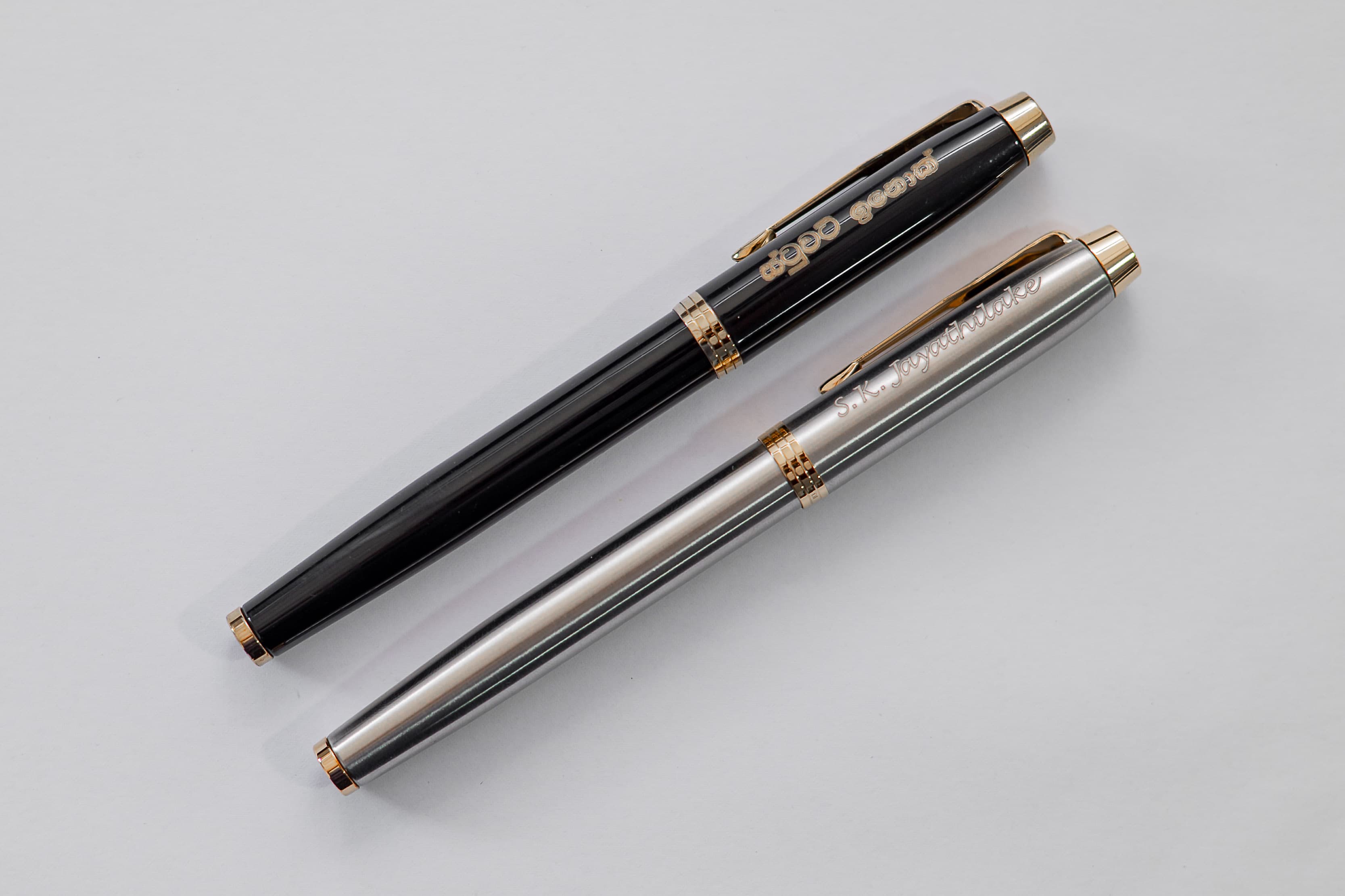 Engraved pen sample — Gold & silver script